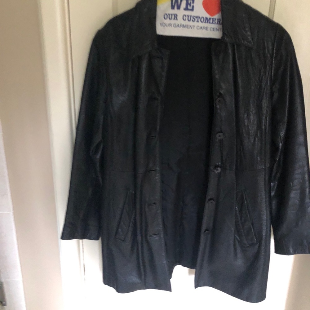 Long leather jacket, hits mid thigh